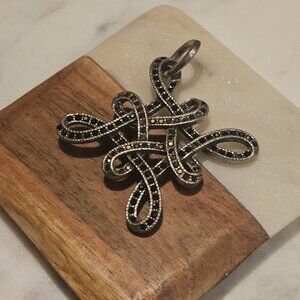 SILVER TONE PENDANT STUDDED WITH RHINESTONES